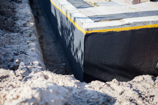Professional Emergency Waterproofing technician working in Pavilion, NY